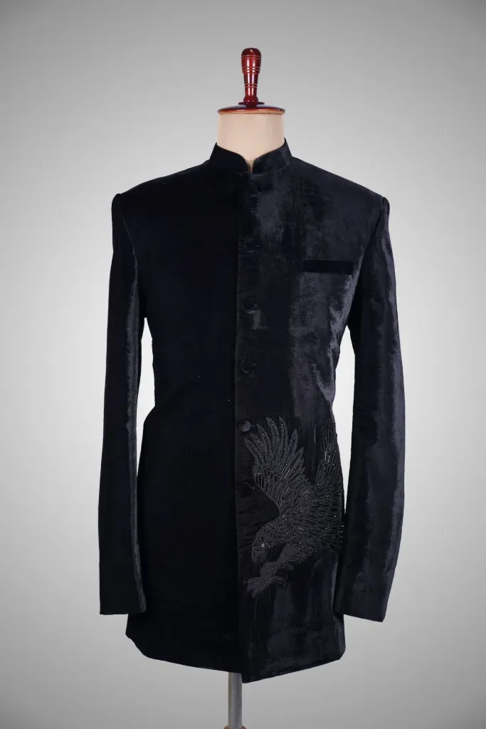 Velvet blazer with bird motif.