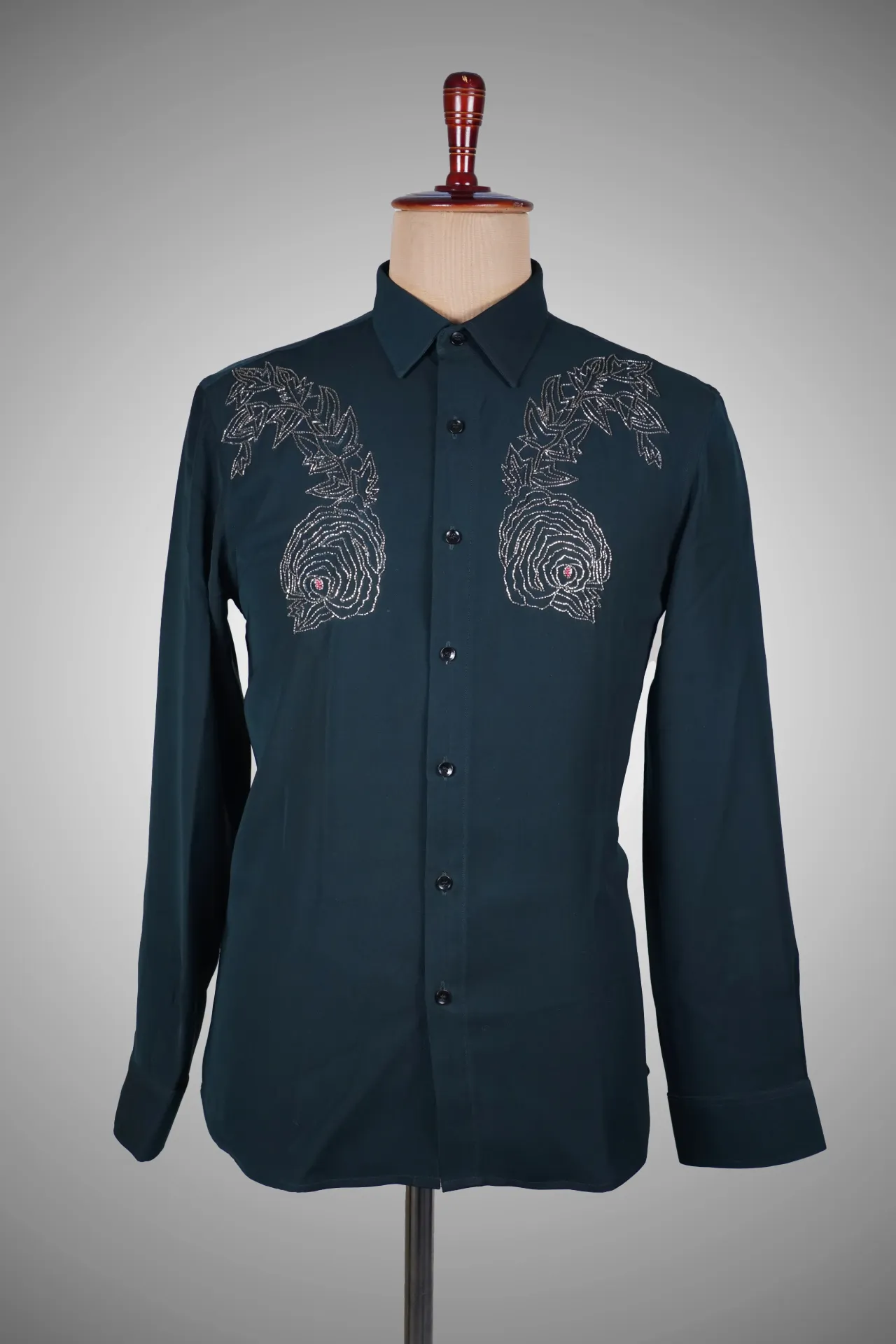 Dark forest green shirt with floral motifs